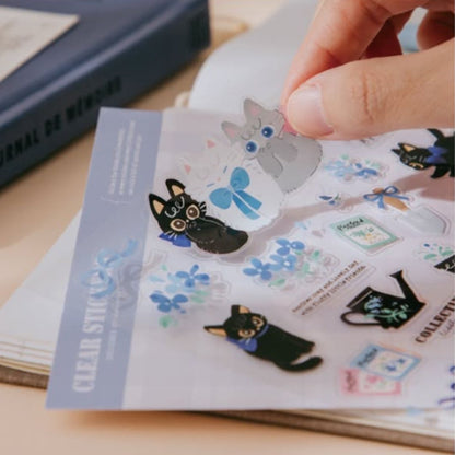 wwiinngg Clear Sticker - Blue Garden Cats